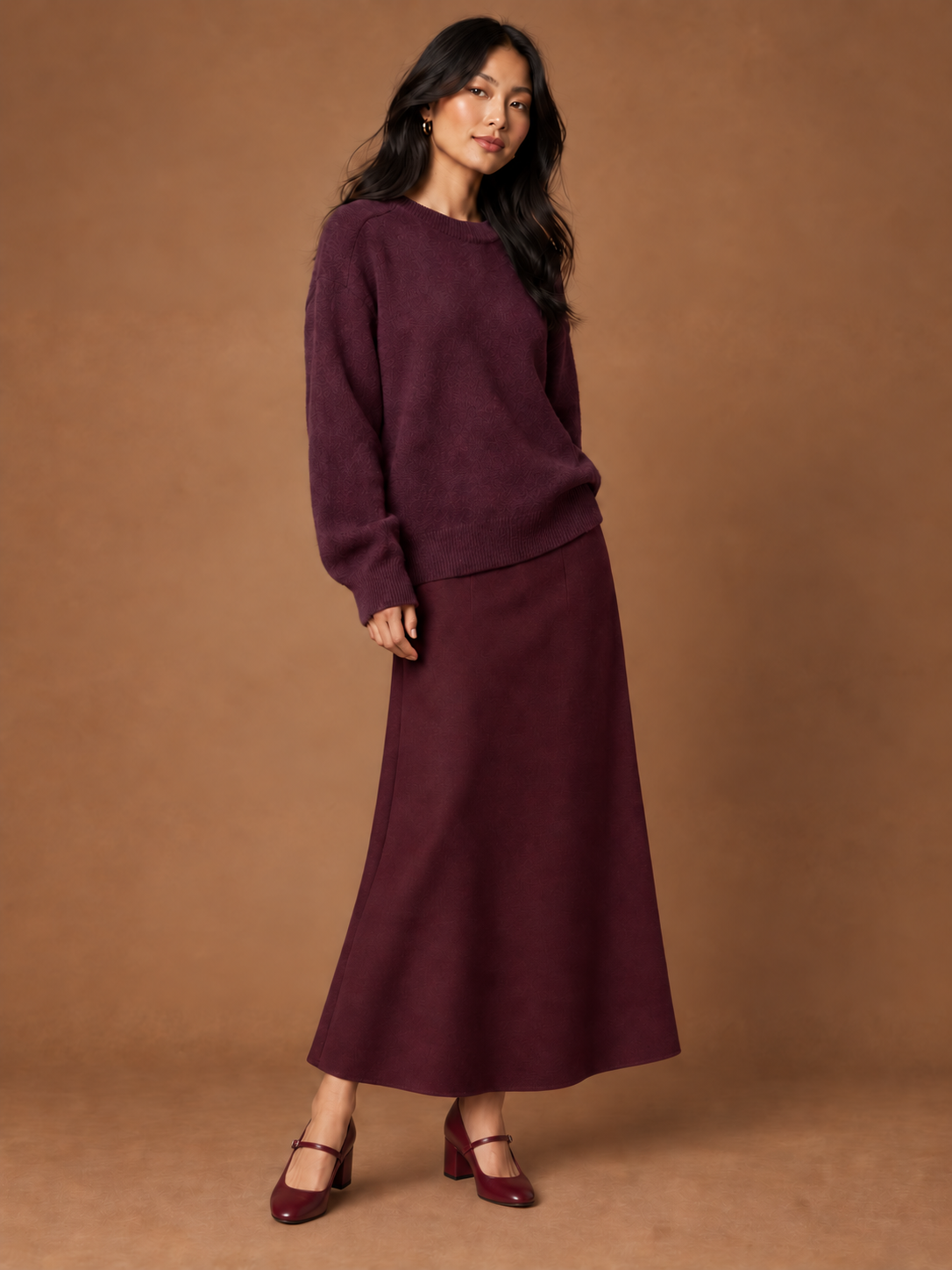 Model wearing the Autumn Burgundy Look with jumper and maxi skirt