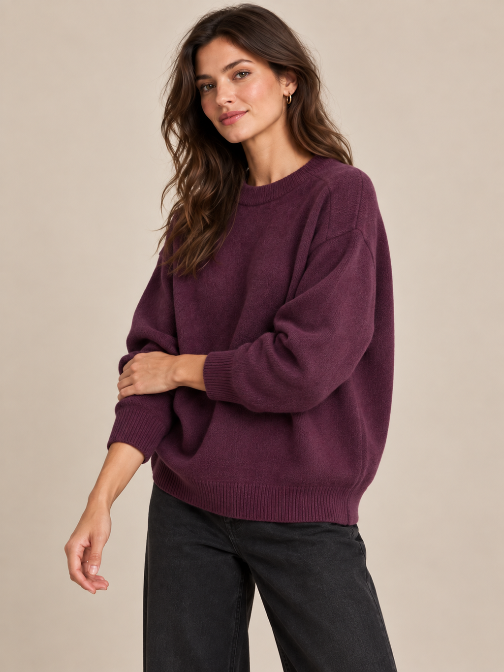 Model wearing the Burgundy Soft Knit Crew Neck Jumper, three quarter view showing the dropped shoulder and ribbed cuff