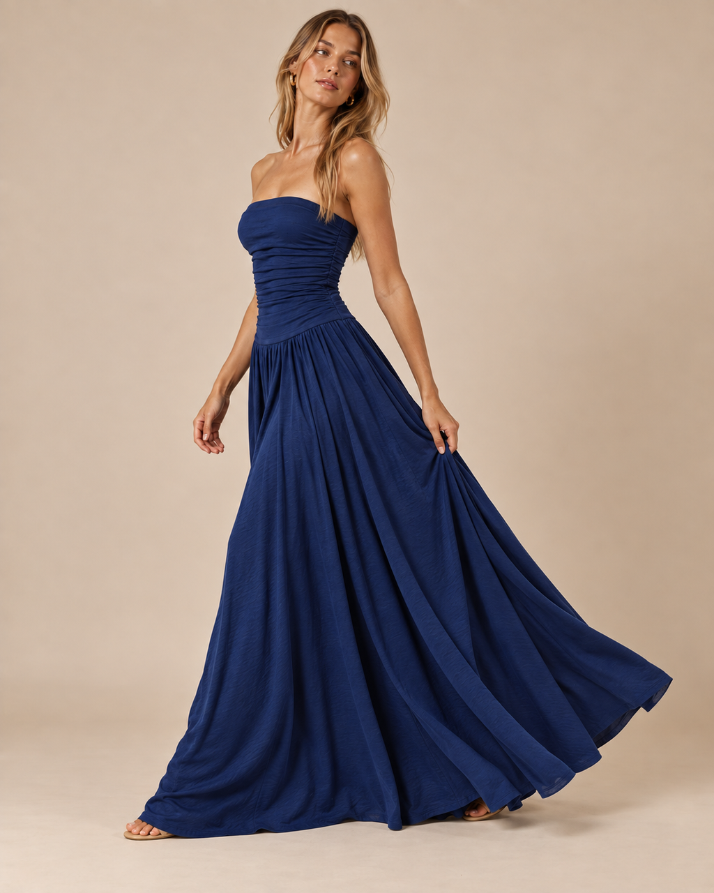 Strapless Ruched Drop Waist Maxi Dress in Navy Blue, on model, skirt in motion