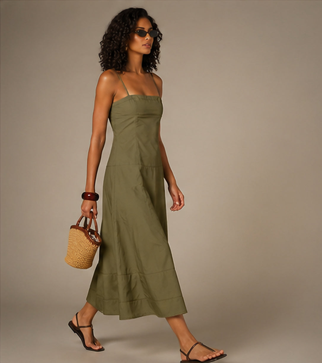 Tiered Cotton Midi Dress in Olive Green, side view in motion