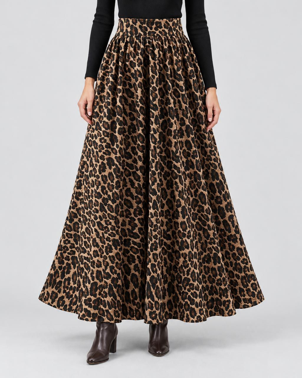Leopard Print High Waist Maxi Skirt in Leopard Print, front view on model with a black knit top