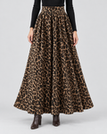 Leopard Print High Waist Maxi Skirt in Leopard Print, front view on model with a black knit top