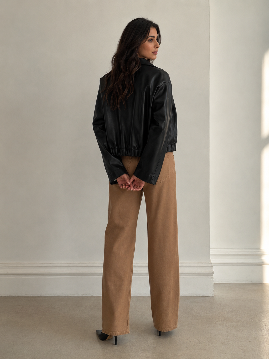 Black faux leather bomber jacket