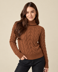 Cable Knit Turtleneck Jumper in Rust, front view on model
