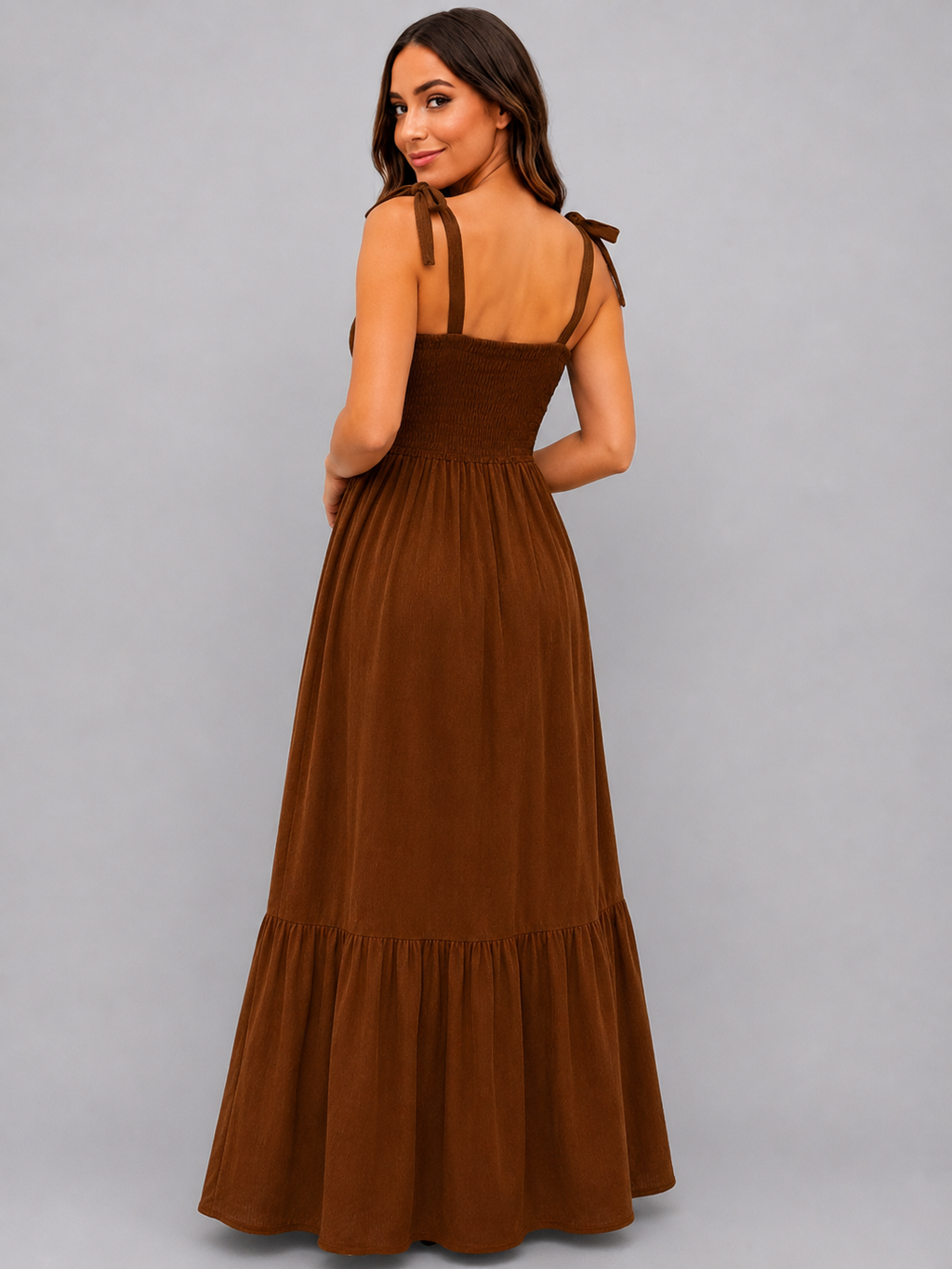 Model wearing the Chestnut Shirred Tie-Strap Tiered Maxi Dress, back view