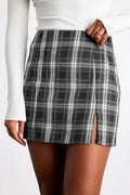 Grey Tartan Split Mini Skirt worn with a white ribbed top, front view showing the split